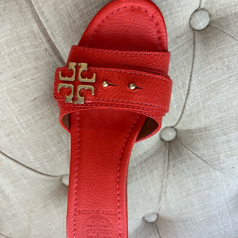 Size 7 orange Tory Burch wedges in excellent used condition.
